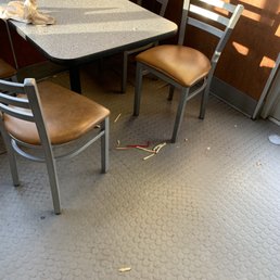 Dirty floor and table. The picture doesn't show the gross table very well. Dirty floor and table. The picture doesn't show the gross table very well.