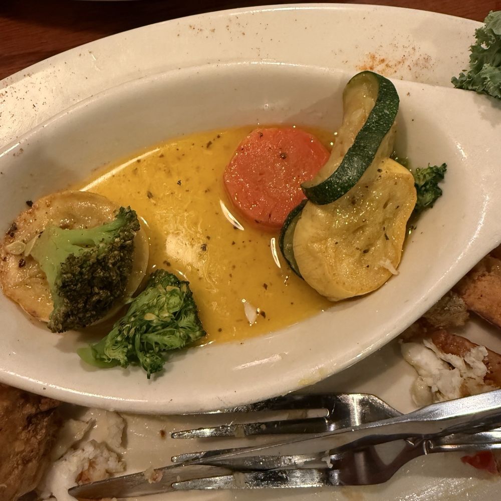 Limp vegetables from frozen in a pool of butter Limp vegetables from frozen in a pool of butter