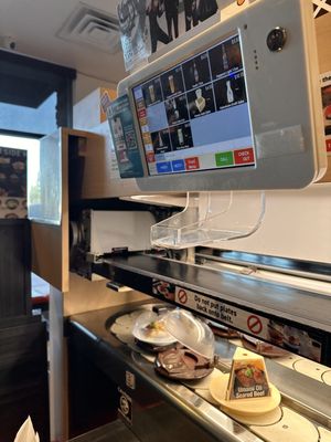 Kura Revolving Sushi Bar by null