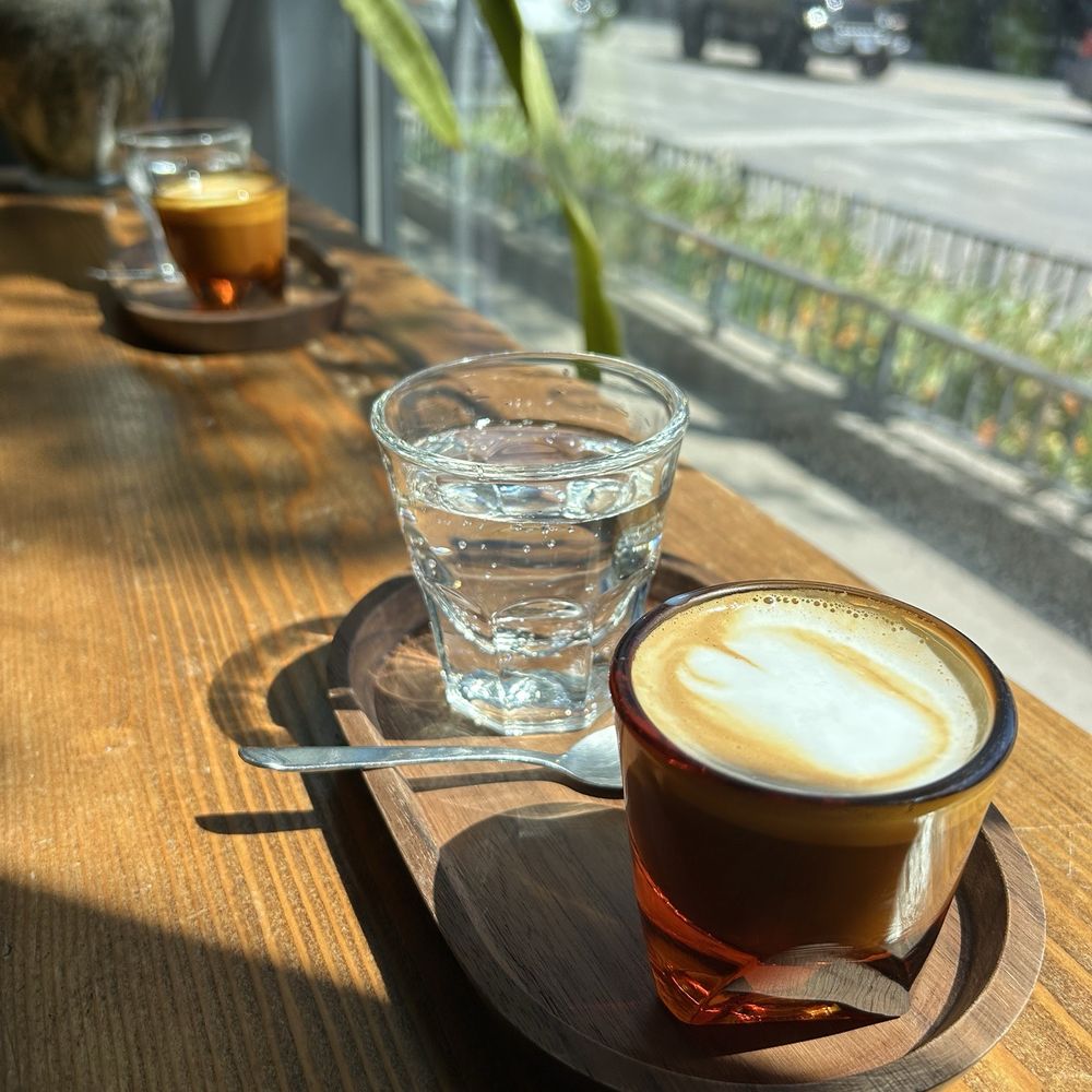 Groundswell Coffee Roasters - Two macchiatos, each served with sparkling water - Coffee Roasteries Near Me - Chicago, Illinois Groundswell Coffee Roasters - Two macchiatos, each served with sparkling water - Coffee Roasteries Near Me - Chicago, Illinois