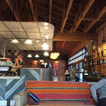 Dripp - Cool exposed rafter beams and exposed brick. - Coffee & Tea Near Me - Fullerton, California