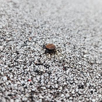 Nicholas Roofing & Tuckpointing - One of the 4 nails in the roof. - Roofing Near Me Nicholas Roofing & Tuckpointing - One of the 4 nails in the roof. - Roofing Near Me