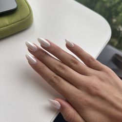 Glam Nails And Spa - Gel X nails with a milky white OPI base (not sure exactly what color) and chrome powder for pearl effect