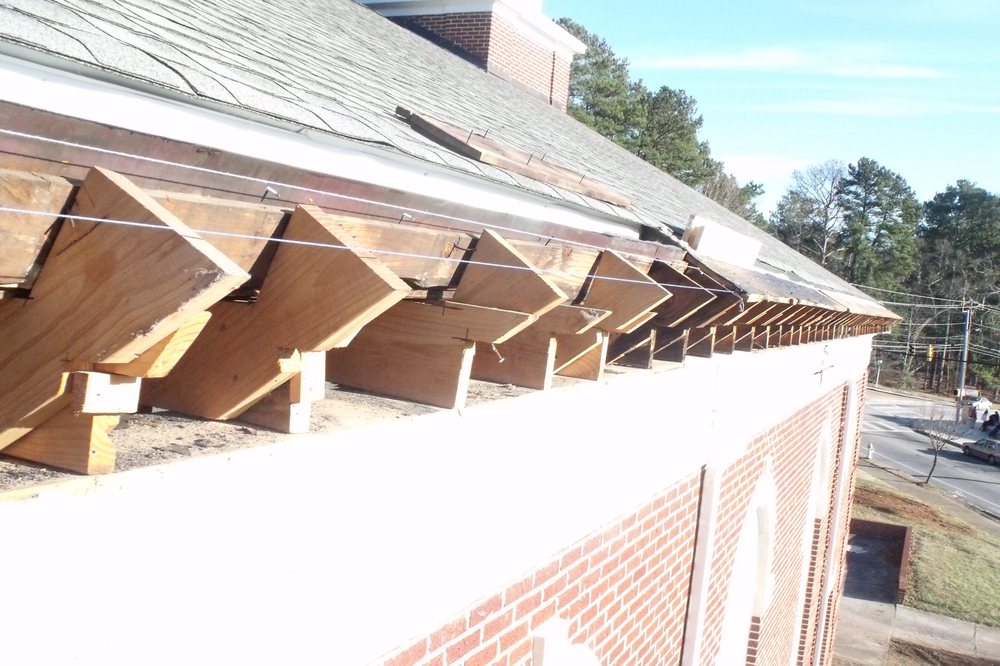 Slide of Dave Clark Roofing