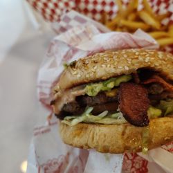 Hamburger with avocado and thick bacon