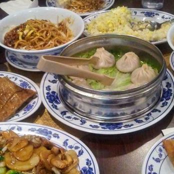 Liu's Shanghai - left to right : Zha jiang mian, bean curd (mock duck), rice cakes, Shanghai fried rice, xiao long bao, pork chop noodle, scallion pancake - Shanghainese Near Me - Brooklyn, New York