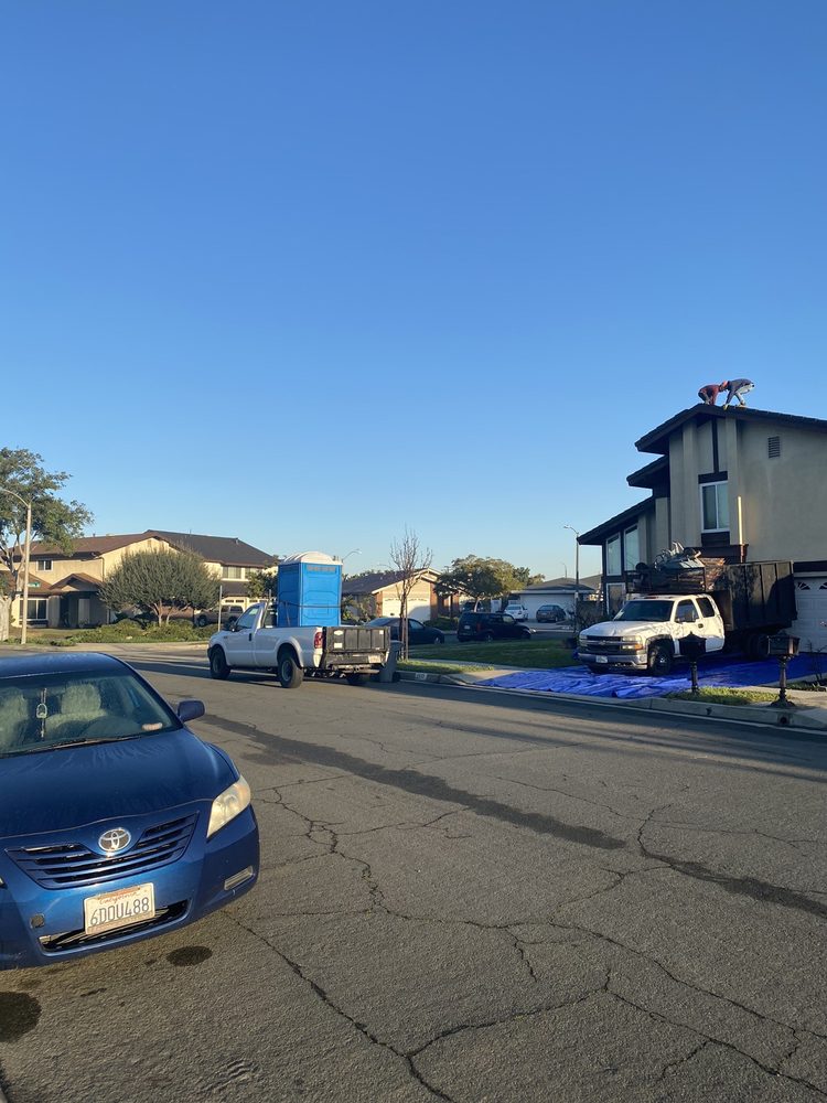 Slide of Yoshida Roofing Company