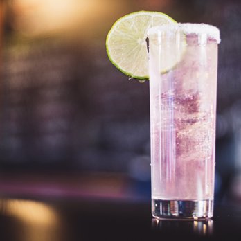 Ye Olde Corner Tap - a purple cocktail with a lime slice - Cocktail Bars Near Me - McHenry, Illinois Ye Olde Corner Tap - a purple cocktail with a lime slice - Cocktail Bars Near Me - McHenry, Illinois