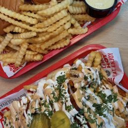 Two chicken sandwiches w fries and chicken cheese fries Two chicken sandwiches w fries and chicken cheese fries