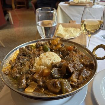 Constantinople - Beef stew very flavorful not spicy. Good pour of wine when I got it - Turkish Near Me - Portland, Oregon