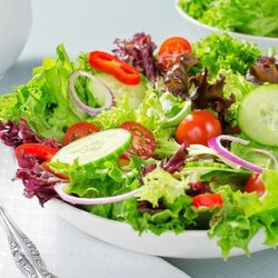 5th Street Bistro - Mixed Green Salad. With cherry tomatoes, shaved cucumber,  house made croutons and balsamic vinaigrette.