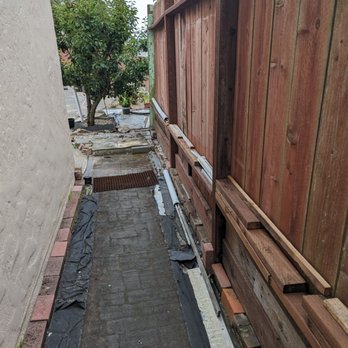 Go Green Landscape - Our original walkway was just weed cloth, bricks, incorrectly installed French drain, and carpet. Quite messy. - Landscaping Near Me - San Francisco, California Go Green Landscape - Our original walkway was just weed cloth, bricks, incorrectly installed French drain, and carpet. Quite messy. - Landscaping Near Me - San Francisco, California