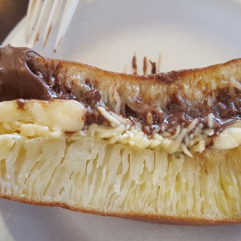 Martabak Cafe - The Crumpet like Martabak with Nutella, banana and cheese. - Desserts Near Me - West Covina, California Martabak Cafe - The Crumpet like Martabak with Nutella, banana and cheese. - Desserts Near Me - West Covina, California
