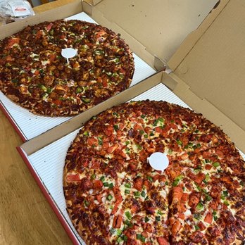 Can Am Pizza - Left: korean spicy pizza XL Right : butter chicken pizza XL - Pizza Near Me - Kent, Washington Can Am Pizza - Left: korean spicy pizza XL Right : butter chicken pizza XL - Pizza Near Me - Kent, Washington