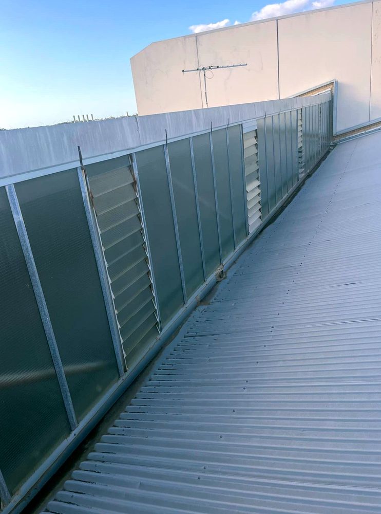 Slide of Melita Roofing