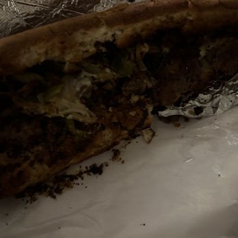 Mark's Pizzeria - a half eaten sandwich - Pizza Near Me - Brockport, New York