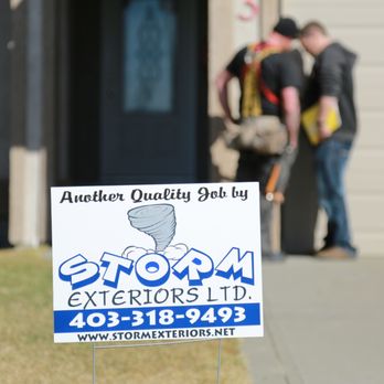 Storm Exteriors - a sign in front of a home - General Contractors Near Me - Red Deer County, Alberta Storm Exteriors - a sign in front of a home - General Contractors Near Me - Red Deer County, Alberta