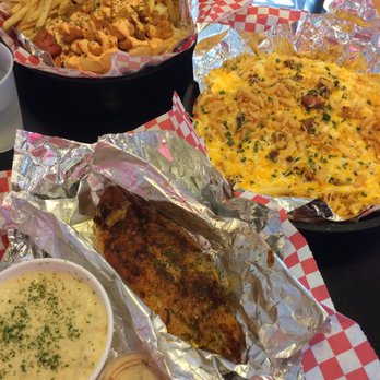 Off The Hook Seafood Eatery - Crawfish po'boy, seafood fries, and grilled catfish and cheese grits. - Seafood Near Me - Oklahoma City, Oklahoma Off The Hook Seafood Eatery - Crawfish po'boy, seafood fries, and grilled catfish and cheese grits. - Seafood Near Me - Oklahoma City, Oklahoma