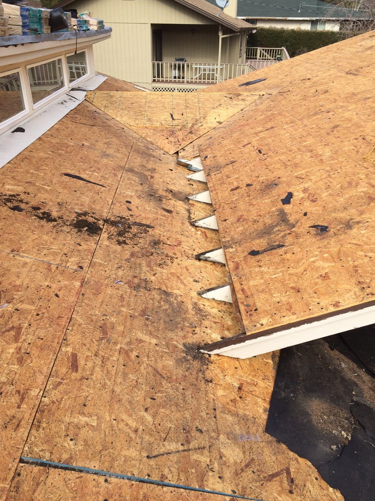 Slide of Kelly Roofing