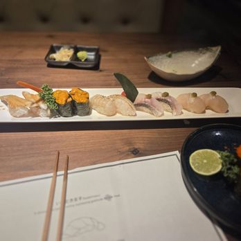 Noma - My various sushi, including Sea Urchin, and the 2 little yellow yolks on the right are Quail Eggs on Smelt Eggs. - Sushi Bars Near Me - Santa Monica, California Noma - My various sushi, including Sea Urchin, and the 2 little yellow yolks on the right are Quail Eggs on Smelt Eggs. - Sushi Bars Near Me - Santa Monica, California