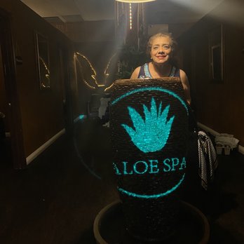 ALOE SPA - Mom posing in front of their Cute little water fountain - Skin Care Near Me - Las Vegas, Nevada ALOE SPA - Mom posing in front of their Cute little water fountain - Skin Care Near Me - Las Vegas, Nevada