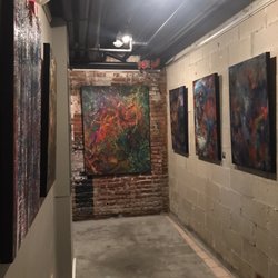 Endiro Coffee - Art displayed in the downstairs hallway