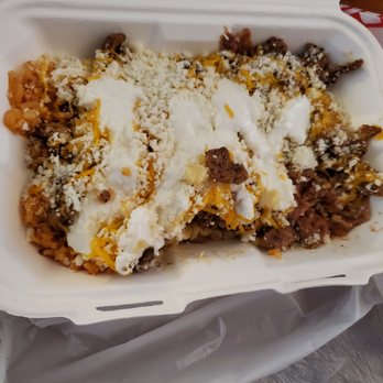 Elote - The bowl. Beans, roasted corns, rice, toped with carne asada, cheese , sour cream. They have many more fresh toppings, - Mexican Near Me - Escondido, California Elote - The bowl. Beans, roasted corns, rice, toped with carne asada, cheese , sour cream. They have many more fresh toppings, - Mexican Near Me - Escondido, California