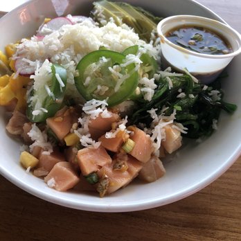 The Deck - Salmon poke bowl (mango, coconut rice, seaweed salad, jalapeño, salmon, avocado) - New American Near Me - Tybee Island, Georgia The Deck - Salmon poke bowl (mango, coconut rice, seaweed salad, jalapeño, salmon, avocado) - New American Near Me - Tybee Island, Georgia