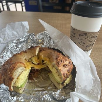 Posh Bagel - Bacon Egg & Cheese add avocado top it off with a Vanilla latte w oat milk - Coffee & Tea Near Me - Pleasant Hill, California Posh Bagel - Bacon Egg & Cheese add avocado top it off with a Vanilla latte w oat milk - Coffee & Tea Near Me - Pleasant Hill, California