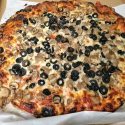Rizzo’s Pizzeria - A large sausage, mushroom and black olive pizza: Our family's favorite! Happy Friday!