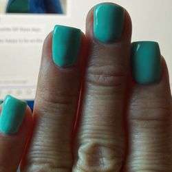 Indulgence Nail Garden - Light blue gel nails.