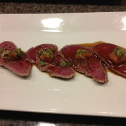 Rice Bistro & Sushi - Beef carpaccio --thicker than normal carpaccio but every bit as delicious and beautifully prepared.