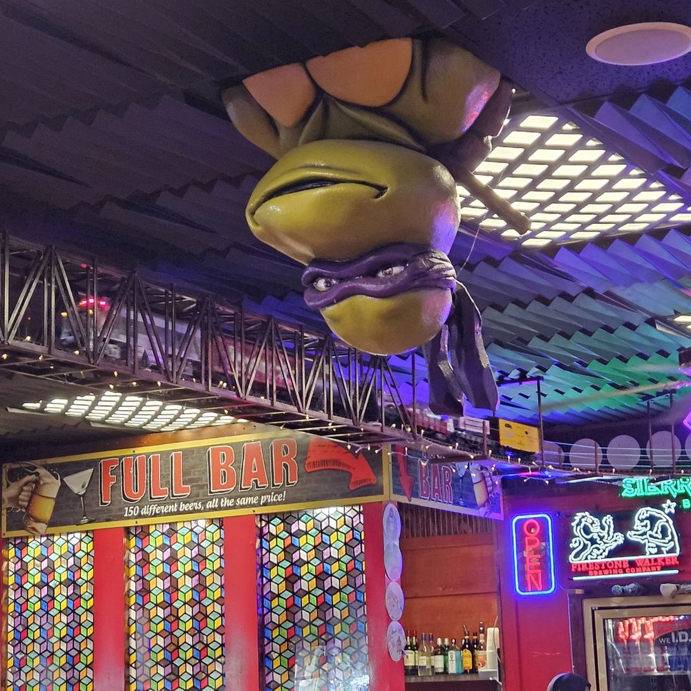 Famous Brick Oven Pizzeria - Quirky, fun interior with moving train - Pizza Near Me - Beech Mountain, North Carolina Famous Brick Oven Pizzeria - Quirky, fun interior with moving train - Pizza Near Me - Beech Mountain, North Carolina