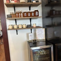 Little Bake Shop - Cute little gift item area including fresh cut flower arrangements in the cooler.