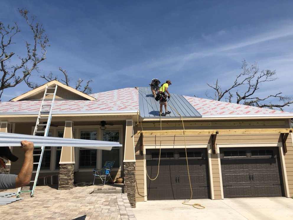 Slide of Old Town Roofing