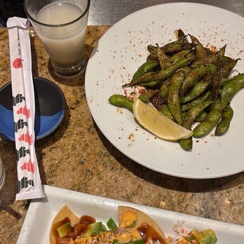 RA Sushi - Mesa - Sushi nachos & garlic edamame (not pictured) spicy salmon snack roll - Japanese Near Me - Mesa, Arizona RA Sushi - Mesa - Sushi nachos & garlic edamame (not pictured) spicy salmon snack roll - Japanese Near Me - Mesa, Arizona