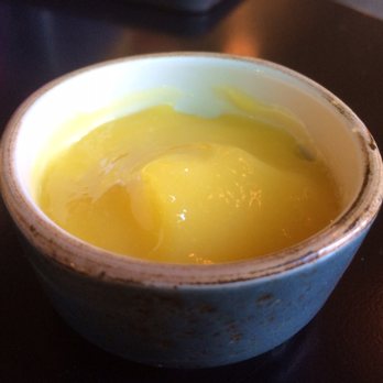The Table - Tart lemon sauce with the beignets - New American Near Me - San Jose, California