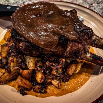 Hooked - Bone in Pork Chop, that brown gravy is excellent. Meat tender and juicy! - Seafood Near Me - Ocean City, Maryland Hooked - Bone in Pork Chop, that brown gravy is excellent. Meat tender and juicy! - Seafood Near Me - Ocean City, Maryland