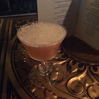 Arcana Bar and Lounge - Grand Cardinal Cross--gin, blood orange shrub, lemon - Cocktail Bars Near Me - Durham, North Carolina Arcana Bar and Lounge - Grand Cardinal Cross--gin, blood orange shrub, lemon - Cocktail Bars Near Me - Durham, North Carolina