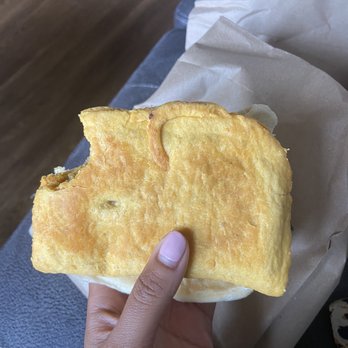 Scotts' Jamaican Bakery - Beef Patty with coco bread behind it - Bakeries Near Me - Hartford, Connecticut Scotts' Jamaican Bakery - Beef Patty with coco bread behind it - Bakeries Near Me - Hartford, Connecticut