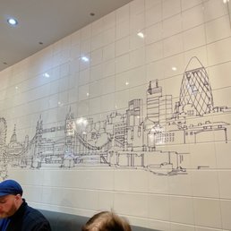 Nice sketch on the white tiles wall at C&R Cafe Nice sketch on the white tiles wall at C&R Cafe