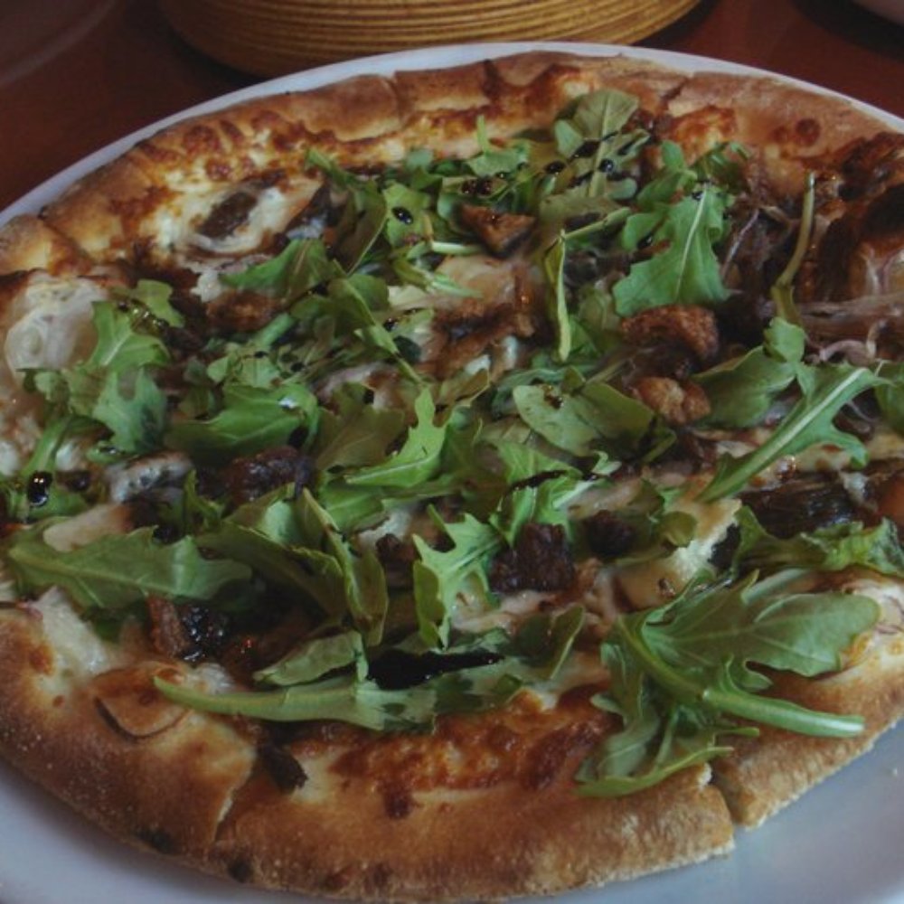 Rustico - Rustico's duck confit and cracklin' pizza. - New American Near Me - Alexandria, Virginia Rustico - Rustico's duck confit and cracklin' pizza. - New American Near Me - Alexandria, Virginia