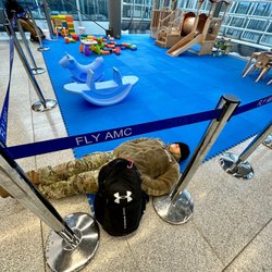 Alex Airport-Shuttle AAS - My good friend taking a nap while waiting for a connecting flight to her deployed location.