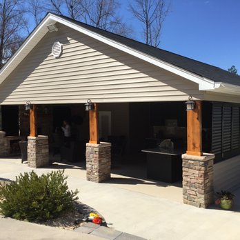 The Improvement Company - a home with a covered patio - General Contractors Near Me - Lexington, South Carolina The Improvement Company - a home with a covered patio - General Contractors Near Me - Lexington, South Carolina