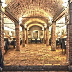 Il Ciocco Countryhouse - La sala ristorante - ex stalla - con le sue volte in mattoni a vista