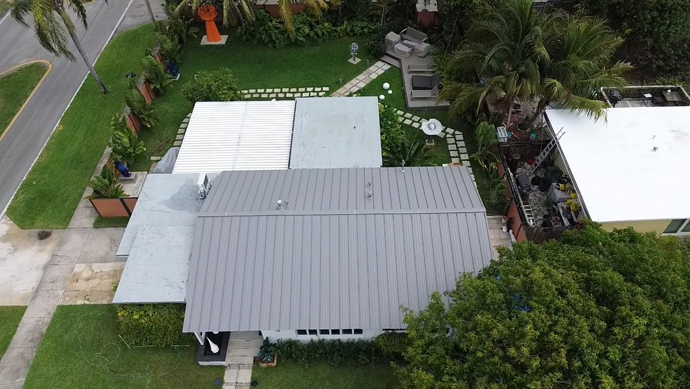 Slide of MC Roofing Service