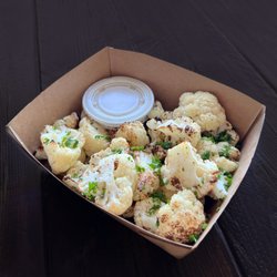 Barbonzai Lebanese Eatery - Our air-fried cauliflower is a wonderful side dish to enjoy. It is nicely seasoned and served with tahini sauce as a dip.