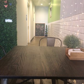 Earthcraft Juicery - Table -- restroom hallway - Juice Bars & Smoothies Near Me - Houston, Texas Earthcraft Juicery - Table -- restroom hallway - Juice Bars & Smoothies Near Me - Houston, Texas