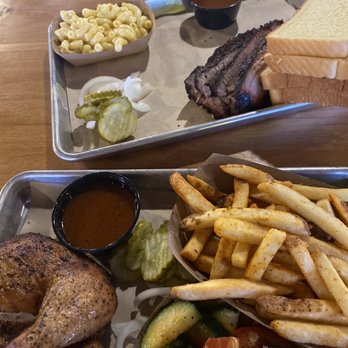 Stiles Switch BBQ & Brew - Brisket with Mac & Cheese, half smoked chicken, French fries and cucumber tomato salad. - Barbeque Near Me - Austin, Texas