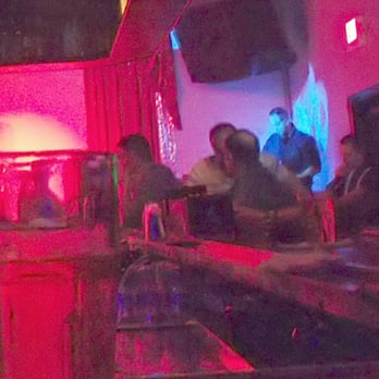 LeBoy - Main bar with stage area...photo intentional blurred to conceal identities. - Gay Bars Near Me - Fort Lauderdale, Florida